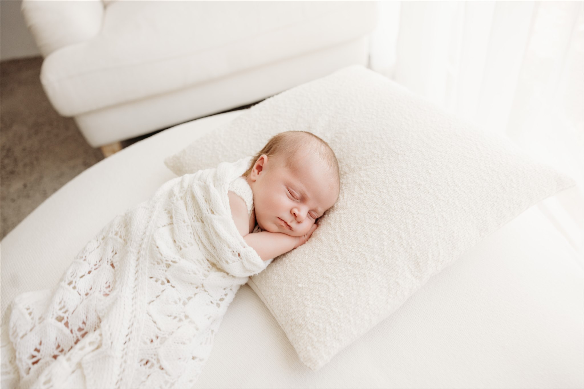 Newborn baby girl in photography studio Michelle Kelly Photography